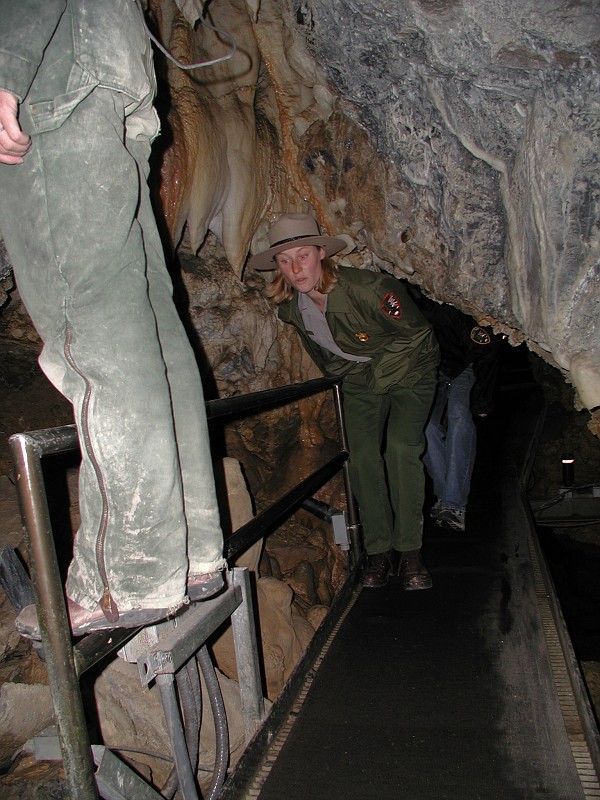 Guides passing through on the Middle Cave Lake Catwalk.